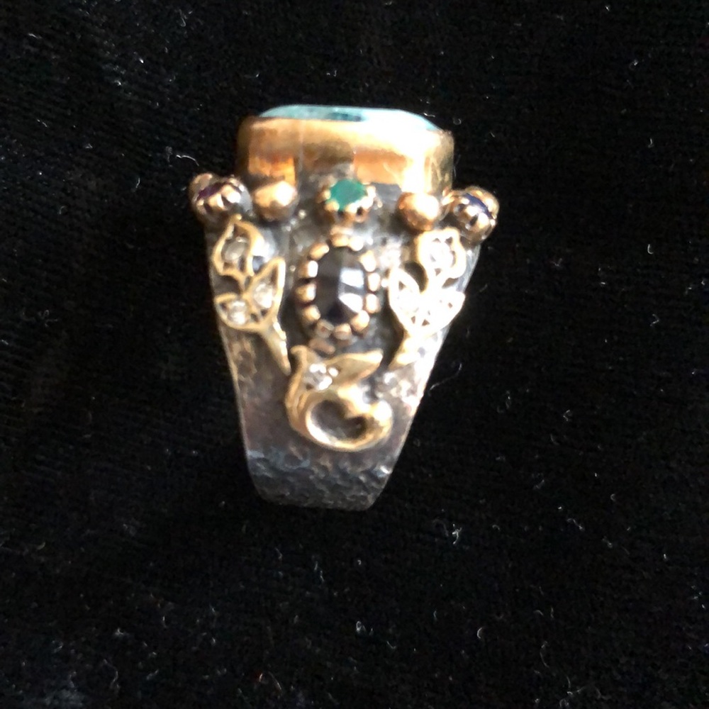 Black Silver Ring with center green stone, exquisitely set small stones